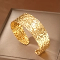 Chic wide open cuff bracelet with a luxury gold hammered metal texture on leather display - Gold Hammered Style (F2735)