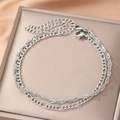 Silbernes zweischichtiges Armband mit Figaro- und gedrehter Kordelkette und Karabiner - Silber (B3046)