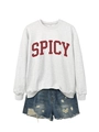 Detail of light grey crewneck sweatshirt with red SPICY print and frayed denim shorts - Off-White