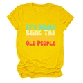 Detailed flat lay of a yellow cotton T-shirt featuring retro slogan printed graphics - Yellow