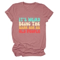Detail view of pink crewneck T-shirt with vintage colorful text print on cotton fabric - Rose Gold