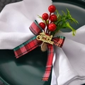 Detail of Christmas napkin ring with red plaid bow, berries and Merry Christmas tag - Letter Bow Red Berry Style