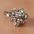 Silver metal napkin ring featuring a cluster of jingle bells for Christmas table decor - Christmas Silver Bell Napkin Ring