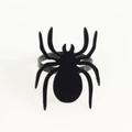 Detail of black spider napkin ring accessory for creative Halloween party table setting - Spider Style