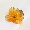 Golden flower napkin ring with hollow-out metal petals on a white cloth napkin - Gold Multi-layer Flower Napkin Ring