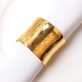 Elegant gold metal napkin ring with hammered texture on a white cloth napkin - Golden Butterfly Pattern (ZWZ-INR-174)