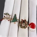 Set of 4 Christmas napkin rings with reindeer, tree, wreath, and santa hat designs - 4 Pcs/Set (Christmas Series)