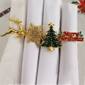 Close-up of festive napkin rings with reindeer, snowflake, tree and Merry Christmas motifs - Enamel Christmas Series Combo Napkin Rings (Set of 4)