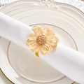 Detailed close-up of handmade straw flower napkin ring with a gold metal band - Beige Handmade Straw Flower (Metal Ring)