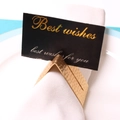 Hammered gold metal napkin ring with integrated card slot and card on white napkin - With Card Holder / Gold