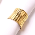 Elegant gold napkin ring with vertical stripes on a white fabric, perfect for table decor - Gold Waist Open Napkin Ring / Gold