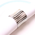 Modern silver napkin ring with vertical striped texture on a white cloth napkin - Silver Waist Open Napkin Ring / Silver