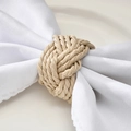 Handcrafted natural straw woven napkin ring in a decorative knot style for table decor - Seagrass Woven Style