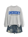 Flat lay of a grey EMT sweatshirt paired with distressed denim shorts on white background - Grey Sweatshirt (Black Text)