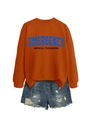 Detail of emergency medical technician print on orange cotton sweater with denim shorts - Burnt Orange Sweatshirt (Black Graphic)