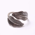 Macro shot of vintage silver leaf ring with detailed veins and oxidized antique finish - Antique Silver