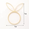 Rond de serviette doré oreilles de lapin avec dimensions de 7cm sur fond blanc - Rond de serviette oreilles de lapin doré