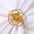 Elegant gold metal napkin ring featuring a hollow rose flower design for table setting - Hollow Rose Style / Gold