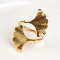 Polished golden ginkgo leaf napkin ring with detailed metallic texture and open design - Gold Ginkgo Leaf Style