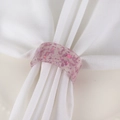 Pink resin napkin ring with gold foil flakes on white fabric for wedding table decor - Purple
