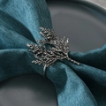 Retro coral branch alloy napkin ring with antique silver finish on a blue textured cloth - Antique Silver Coral Branch