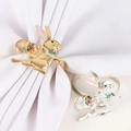 Detail of bunny napkin rings with flower baskets in gold and silver finish for Easter - Running with Basket Style (Style 4)