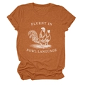 Close-up of rooster graphic and Fluent in Fowl Language print on rust orange t-shirt - S / Burnt Orange (White Text)