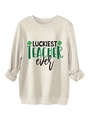 Detail of Luckiest Teacher Ever sweatshirt featuring green shamrock and horseshoe print - S / Sand