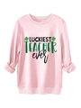 Detail of light pink sweatshirt featuring Luckiest Teacher Ever print and shamrock graphics - Pink