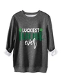 Detail of dark grey fleece sweatshirt featuring green Luckiest Teacher Ever print - Dark Gray