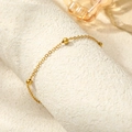 Exotische Vintage-Fußkette mit goldenen Metallperlen und eleganten Kettengliedern - Goldener Rundperlen-Stil (C4781)
