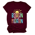 Close-up of wine red crew neck t-shirt with colorful Boatin and Floatin sun print - Burgundy