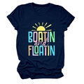 Detail of navy blue t-shirt with Boatin and Floatin print and sun graphic design - Navy Blue
