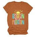 Detail of burnt orange t-shirt showing Boatin and Floatin print and cotton texture - Burnt Orange
