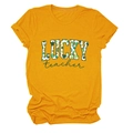 Close-up of vibrant yellow cotton T-shirt with LUCKY teacher clover print detail - S / Mustard Yellow