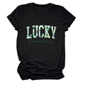 Detail of LUCKY teacher print with green shamrock pattern on a black cotton t-shirt - Black