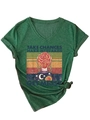 Detail of V-neck T-shirt in dark green with colorful vintage graphic and knot hem - S / Vintage Green