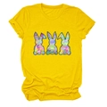 Close-up of three colorful graffiti bunnies printed on a yellow cotton casual t-shirt - Yellow