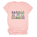Close-up of pink women's T-shirt with three colorful tie-dye rabbit prints on chest - Pink