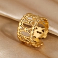 Macro shot of 18k gold plated stainless steel ring with hollow woven geometric design - Geometric Weave Hollow Style (N6577)