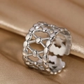 Modern wide hollow geometric stainless steel open ring on golden silk texture background - Geometric Weave Hollow Style (N6578)