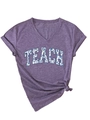 Dettaglio maglietta viola scollo a V con scritte floreali TEACH e nodo laterale moda - Taglia S / Viola