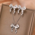 Elegant 18K gold bow jewelry set with necklace and earrings on premium leather box - Silver Bowknot Jewelry Set (N5802)