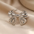 Elegant silver bow-knot open ring with textured stripe finish for women fashion - Silver Bowknot Style (F3158)