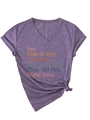 Detail of purple V-neck T-shirt with front knot design and gradient graphic text - S / Purple