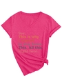 Detail view of pink V-neck t-shirt with text slogan and stylish front knot at the hem - S / Rose Red