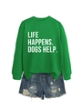 Detail of the Life Happens Dogs Help slogan printed on a green long sleeve sweatshirt - Grass Green (White Font)