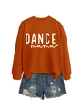 Flat lay of caramel 'DANCE mama' sweatshirt paired with distressed denim shorts - Burnt Orange (White Font)