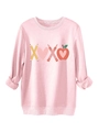 Detail of soft pink plush sweatshirt showing ribbed cuffs and creative XOXO graphic print - Pink