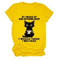 Detailed flat lay of a yellow cotton T-shirt featuring a cute black cat with a coffee mug - Yellow (Black Text)